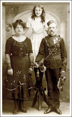 Charles Duly with his wife and daughter