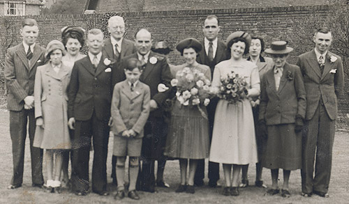 The wedding of Doris Johnson and Norman Dann, Lichfield, 1948 l-r: Horace Johnson (tbc), Elizabeth Dann (tbc), Violet Johnson (tbc), Bill Linney, William Simpson, John Dann (tbc), Norman Dann, Mary Simpson (hidden), Dori